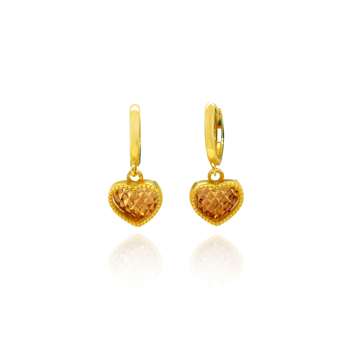 Front view of 14K gold and rose gold diamond cut heart drop huggie earrings.