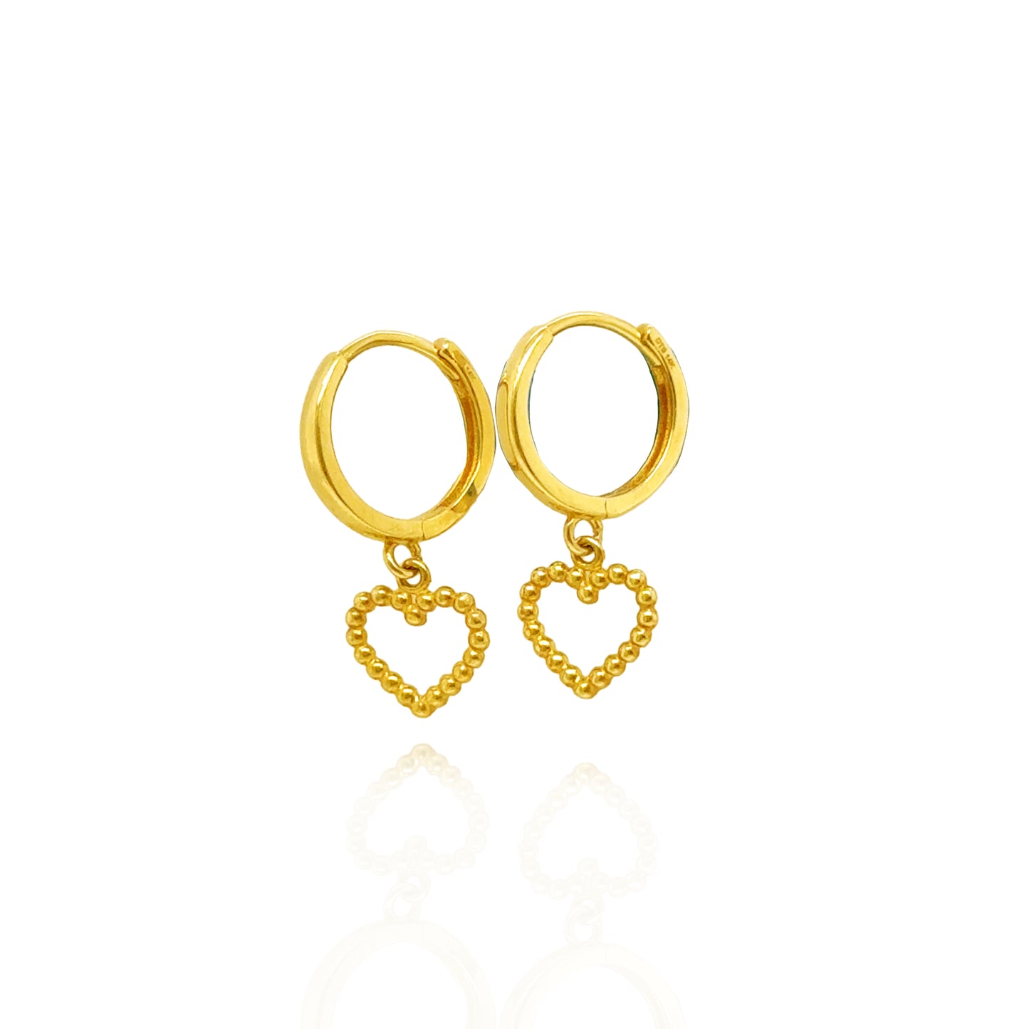 Side view of 14K gold beaded heart drop huggie earrings with polished gold hoops.