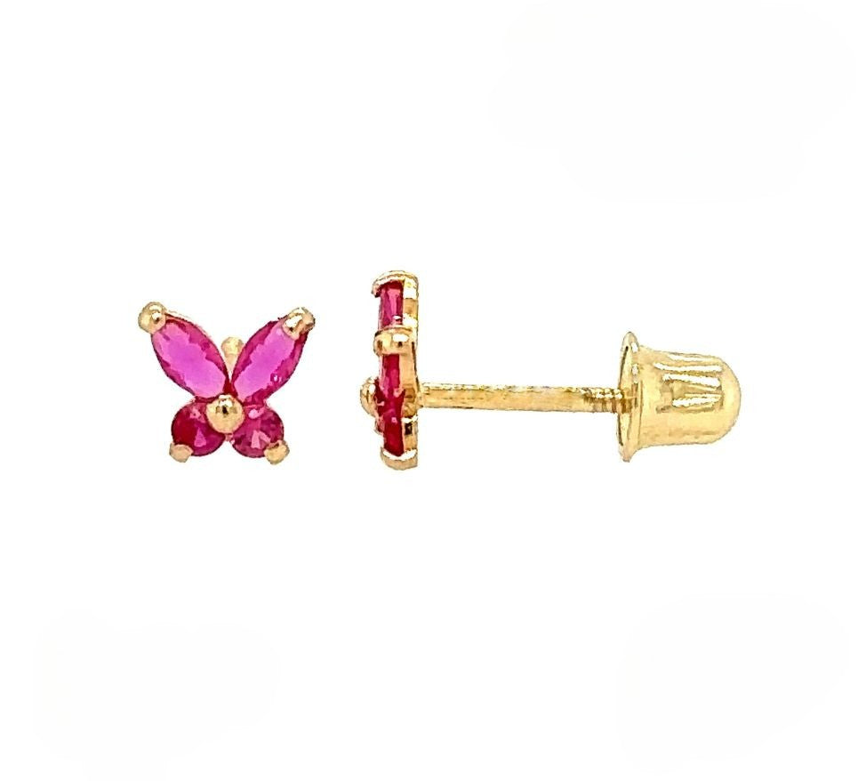 Gold butterfly earrings with pink gemstones on a white background