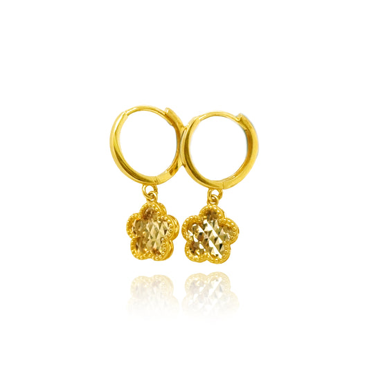 Side view of 14K gold flower drop huggie earrings with diamond cut flower charm.