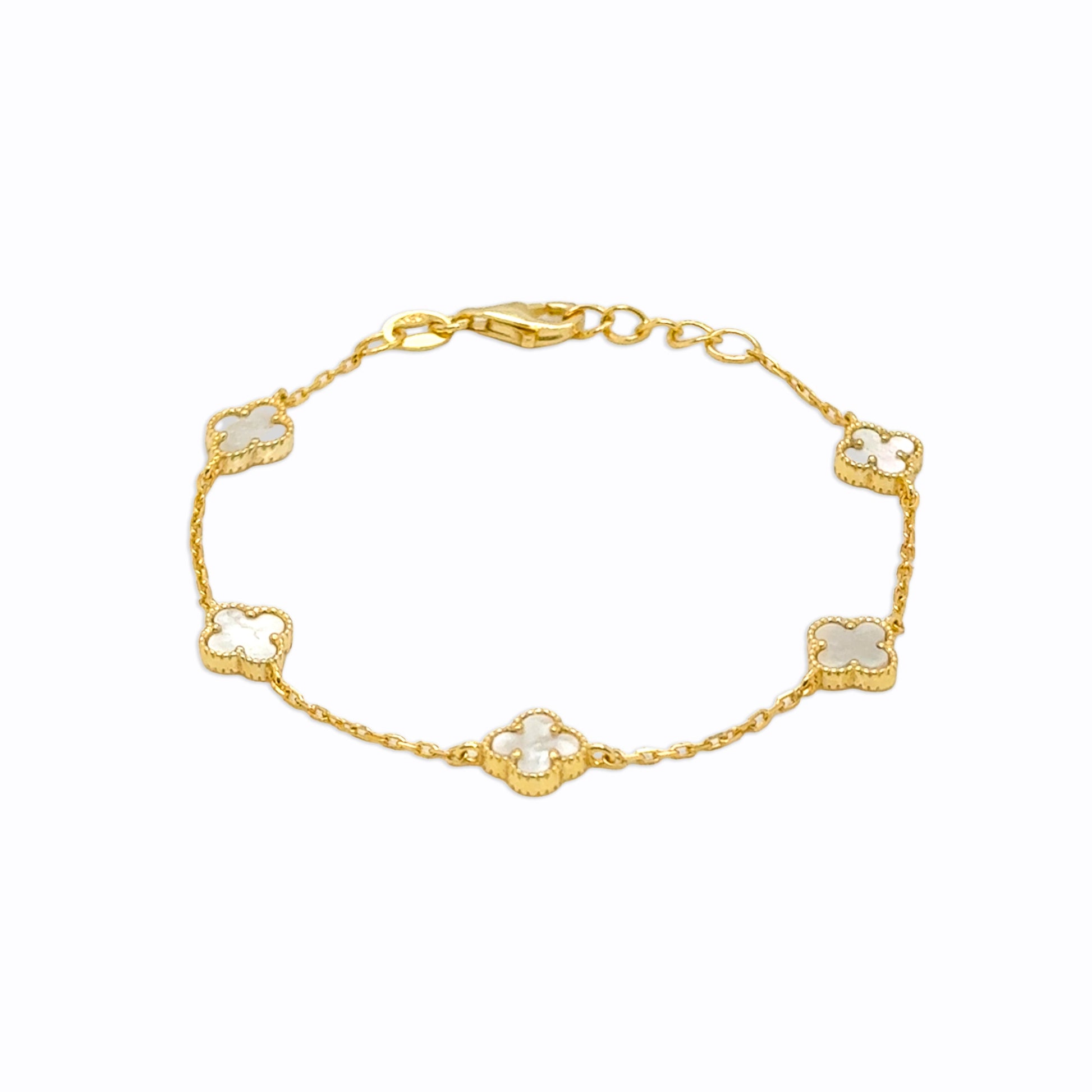 Gold bracelet with clover-shaped charms on a white background